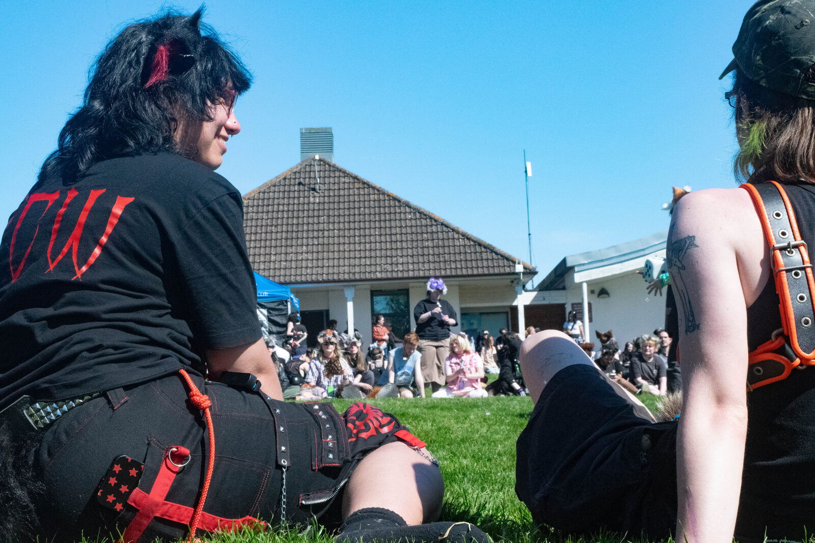 Attendees enjoying the park environment at Pups in the Park